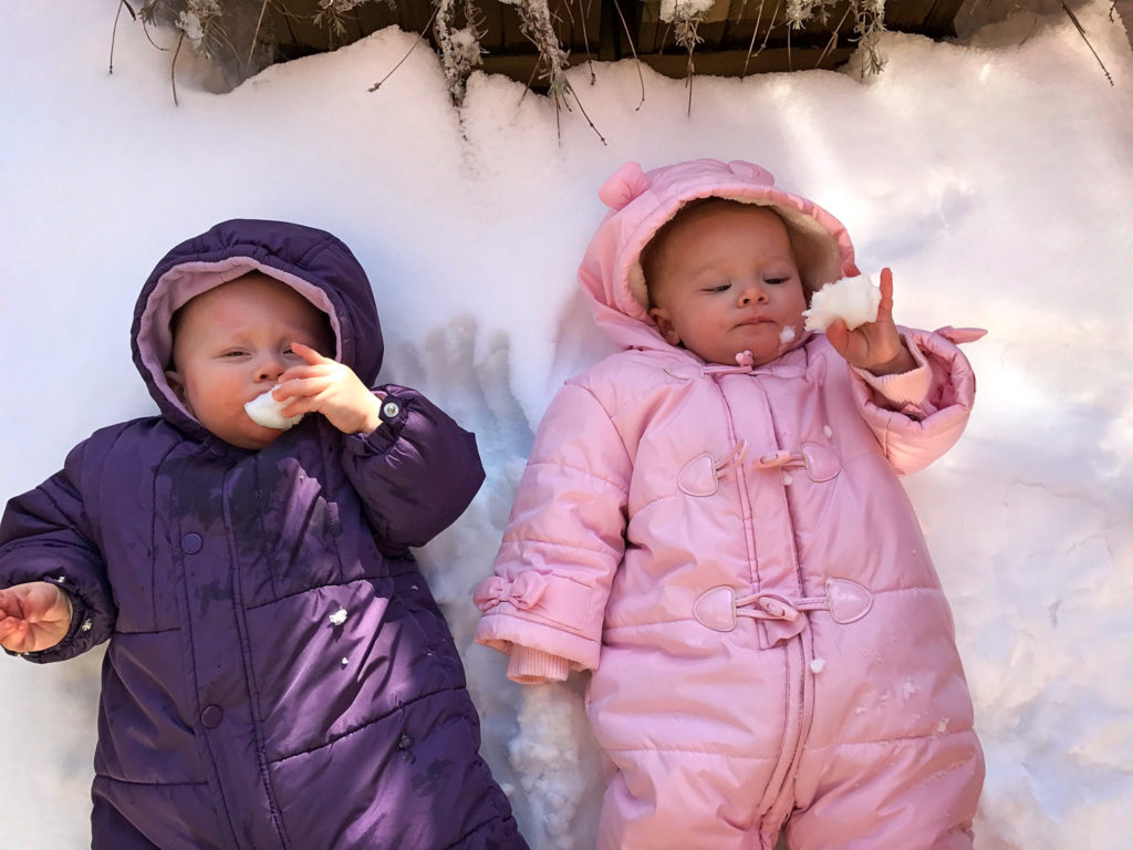 Colin and Addison in their snowsuits.