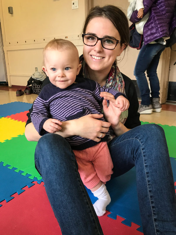 Emily with Addison at the Jump Start Jolly Jumper music program.