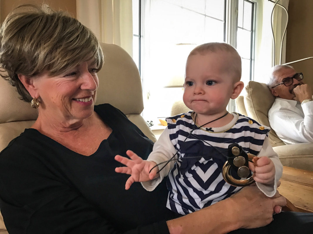 Grammy Teed and Addison hang out – Addison tried on the fancy necklace while Murray looks on in the background.