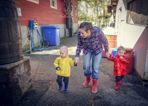 Mommy walks with the kids at Maplewood Farm – going from the bunnies over to the goats.