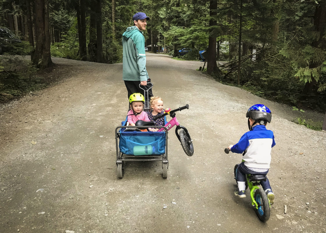 Sam takes wagon duty pulling around Evelyn and Addison, while Colin motors alongside them.