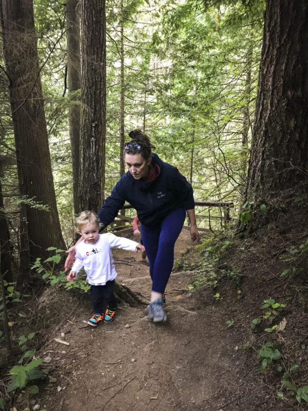 Lauren help Addison up the steep part of the trail.