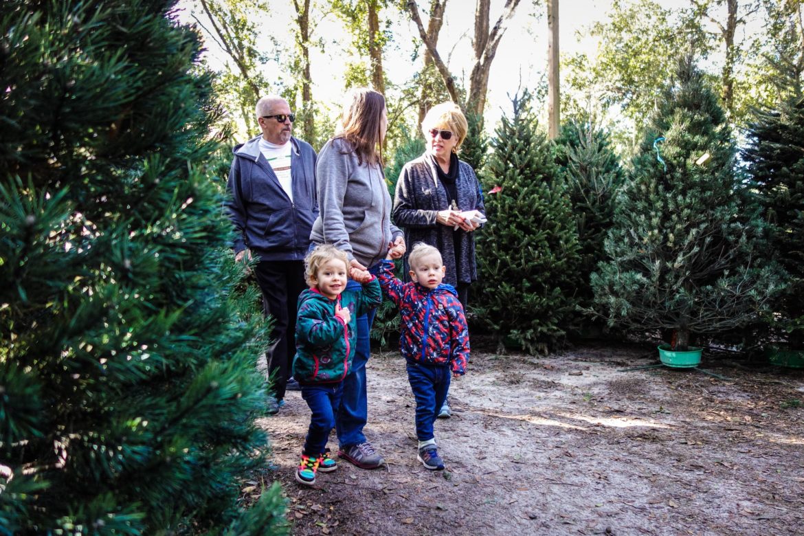 Grandpa Murray and Grandma Pati walking through the forest with mom and the kids.